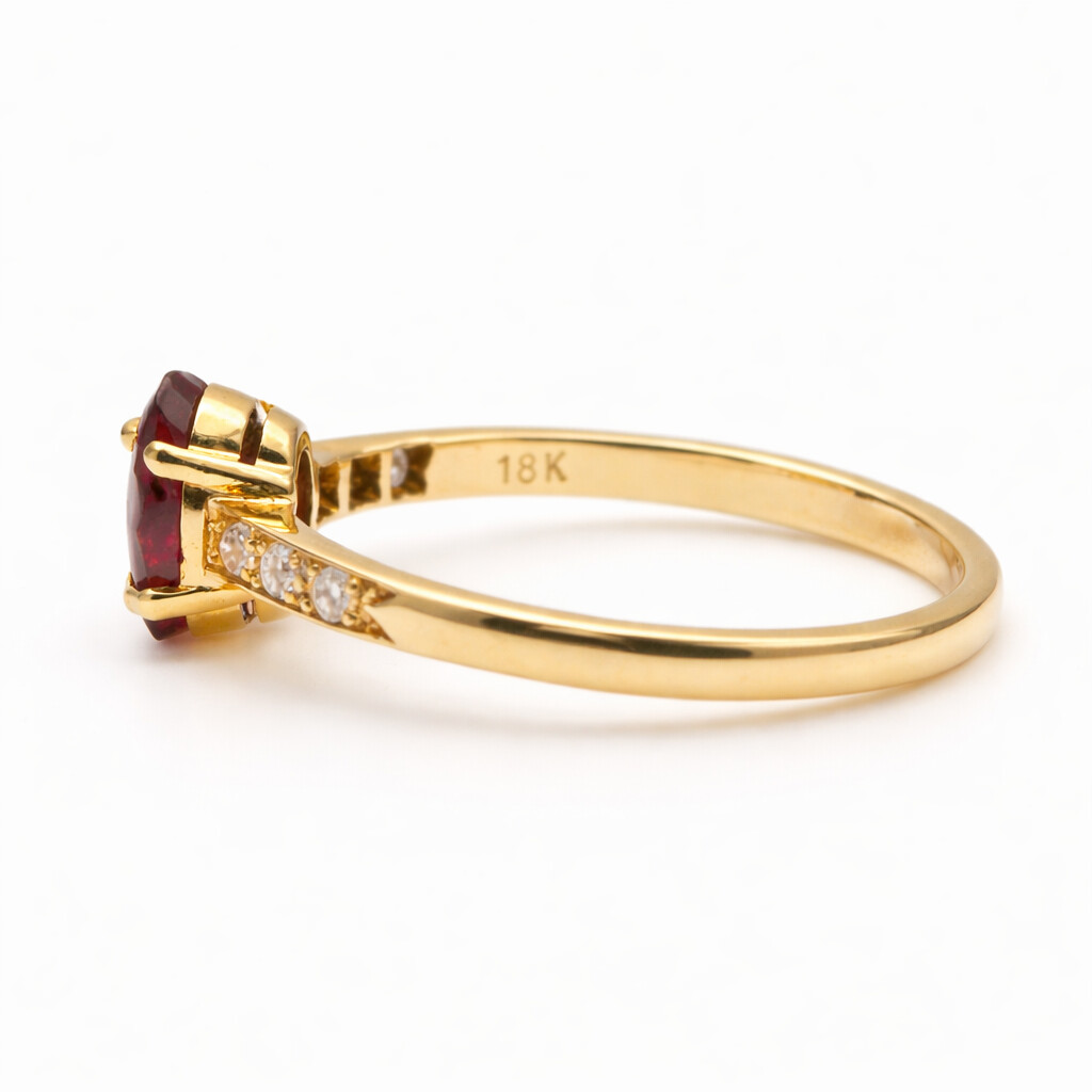 Laurenti 18k yellow gold ruby and diamond ring .81ctw ruby .10ctw diamond.
